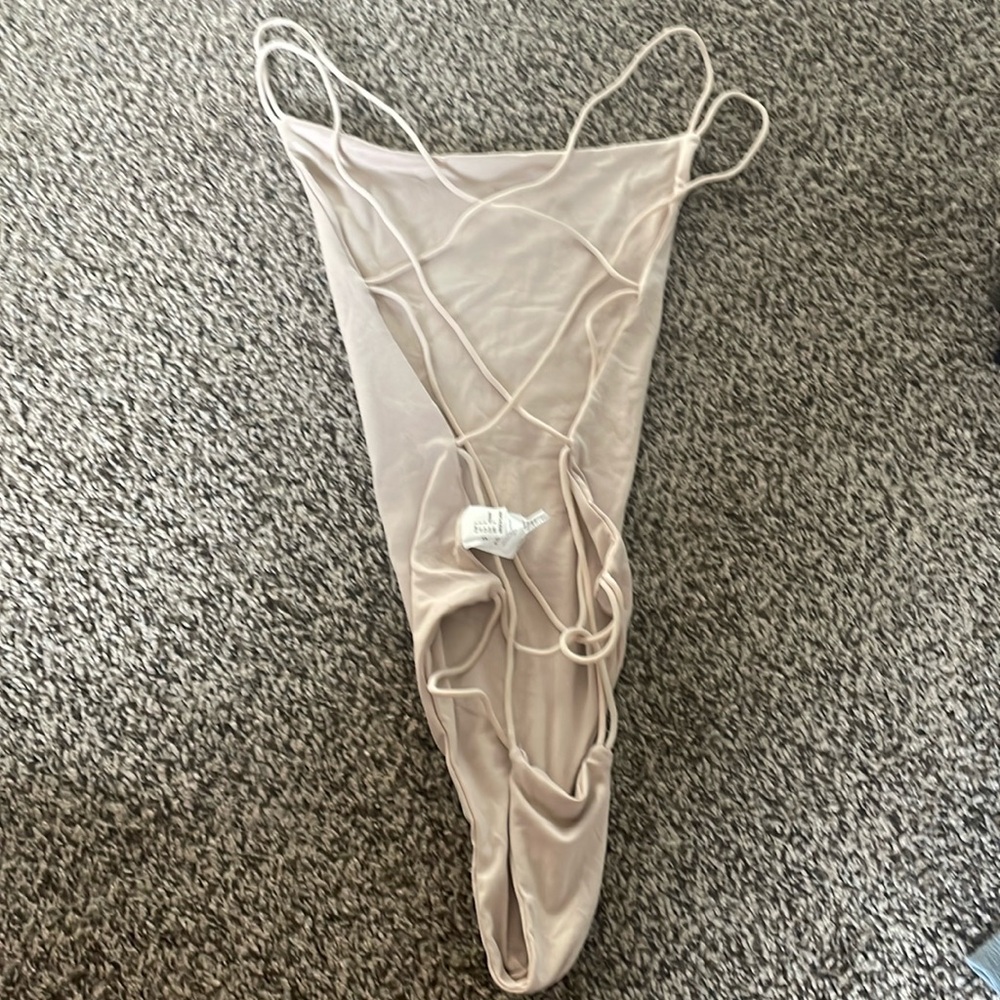 Cross back body suit